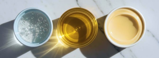 Suplery visual — comparison of water, oil, and emulsion textures representing different vitamin bases.