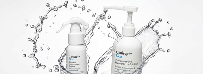 Clinisept+ Skin hypochlorous solution: travel-size spray and professional pump bottle with a dynamic water splash on a clean white background