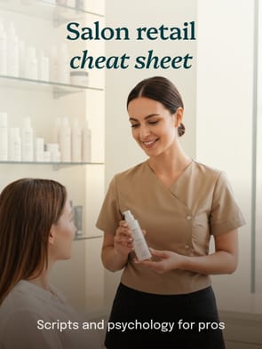 Salon professional recommending retail products to a client with the text “Salon retail cheat sheet — scripts and psychology for pros.”